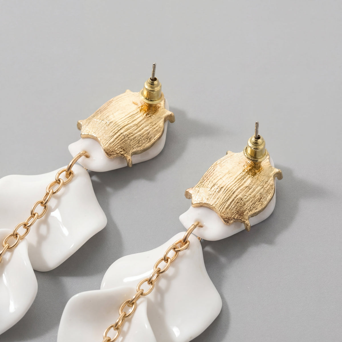 PENDIENTES LARGOS CON PÉTALOS DE ORQUÍDEA